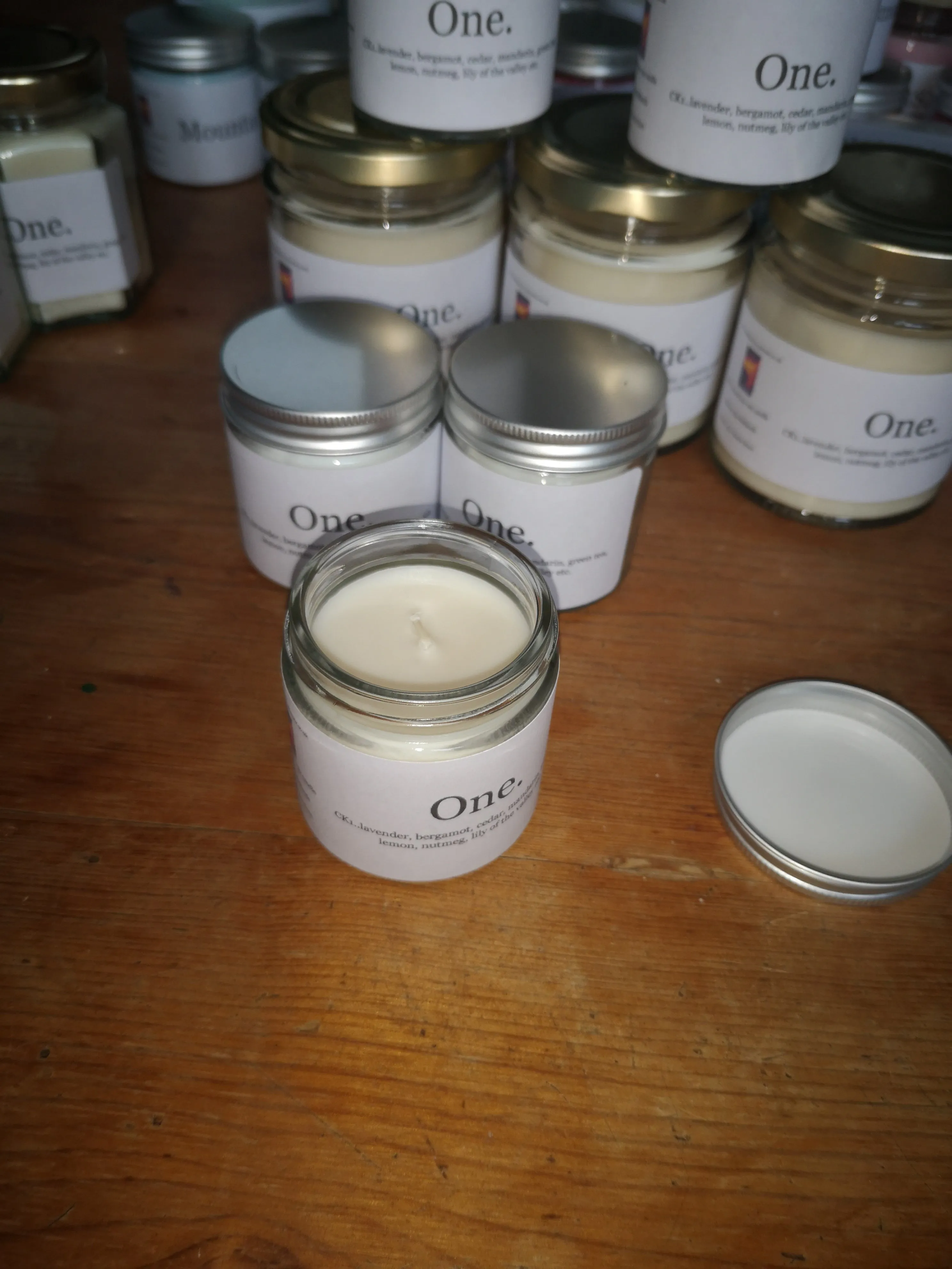 One.  (inspired by CK1 fragrance) hand poured soy wax melts & candles.