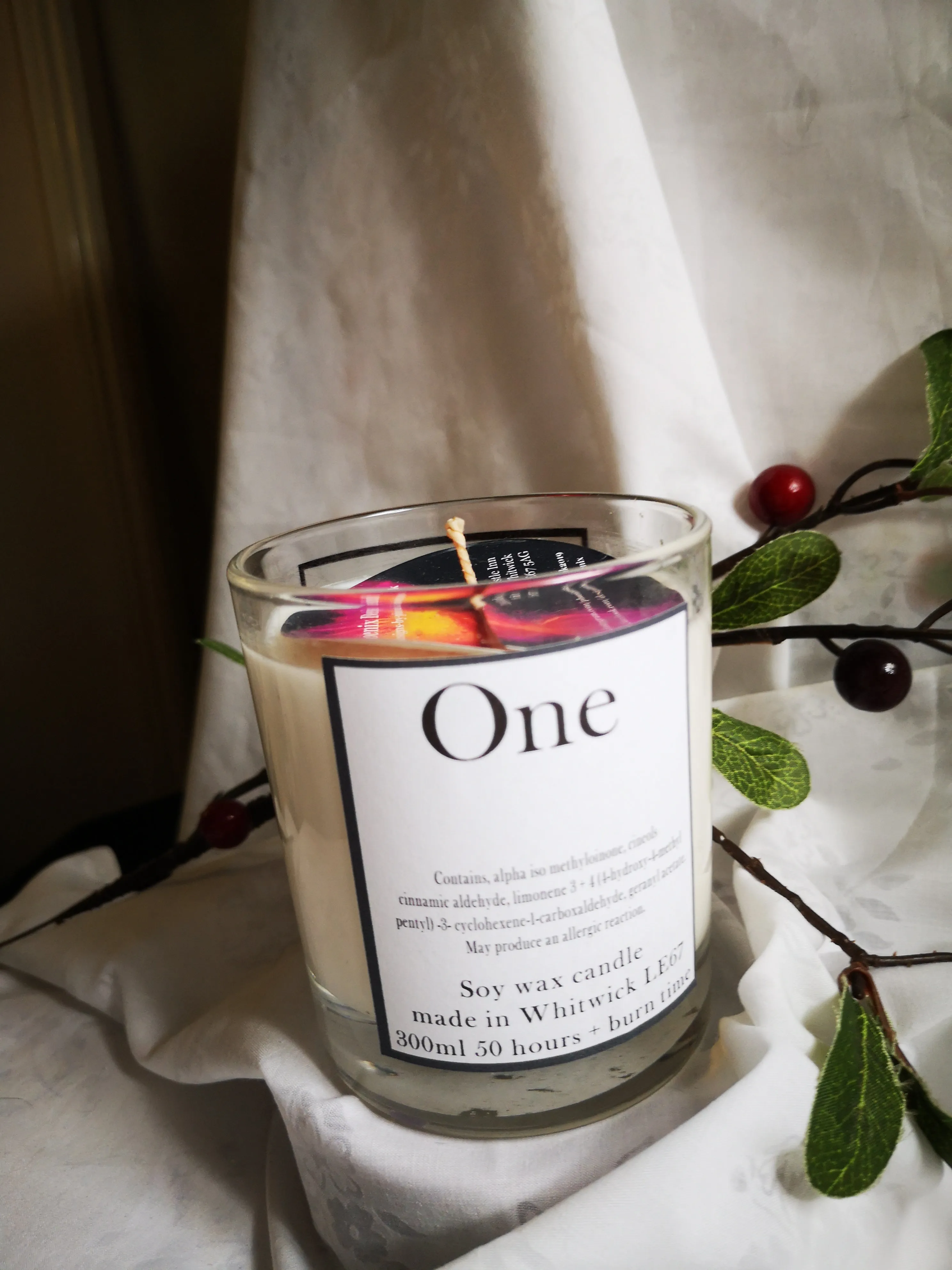 One.  (inspired by CK1 fragrance) hand poured soy wax melts & candles.