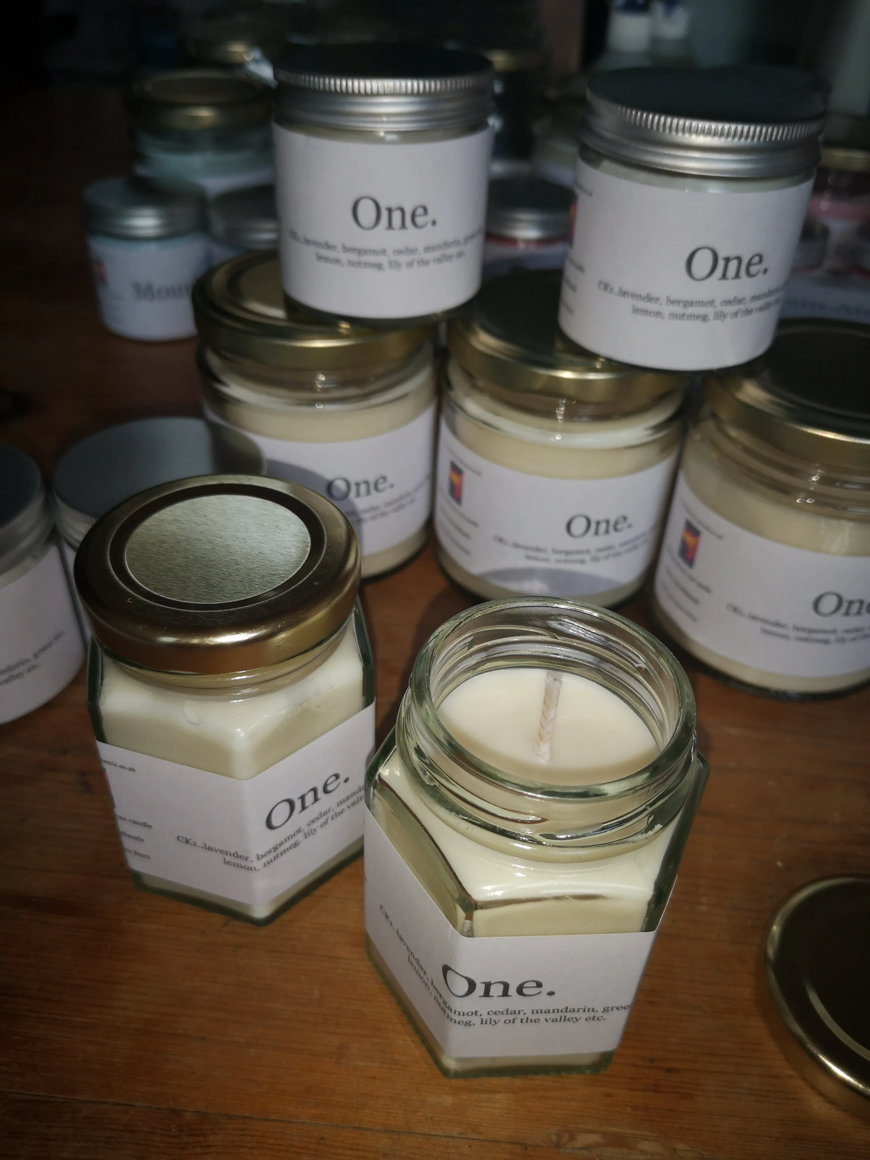 One.  (inspired by CK1 fragrance) hand poured soy wax melts & candles.