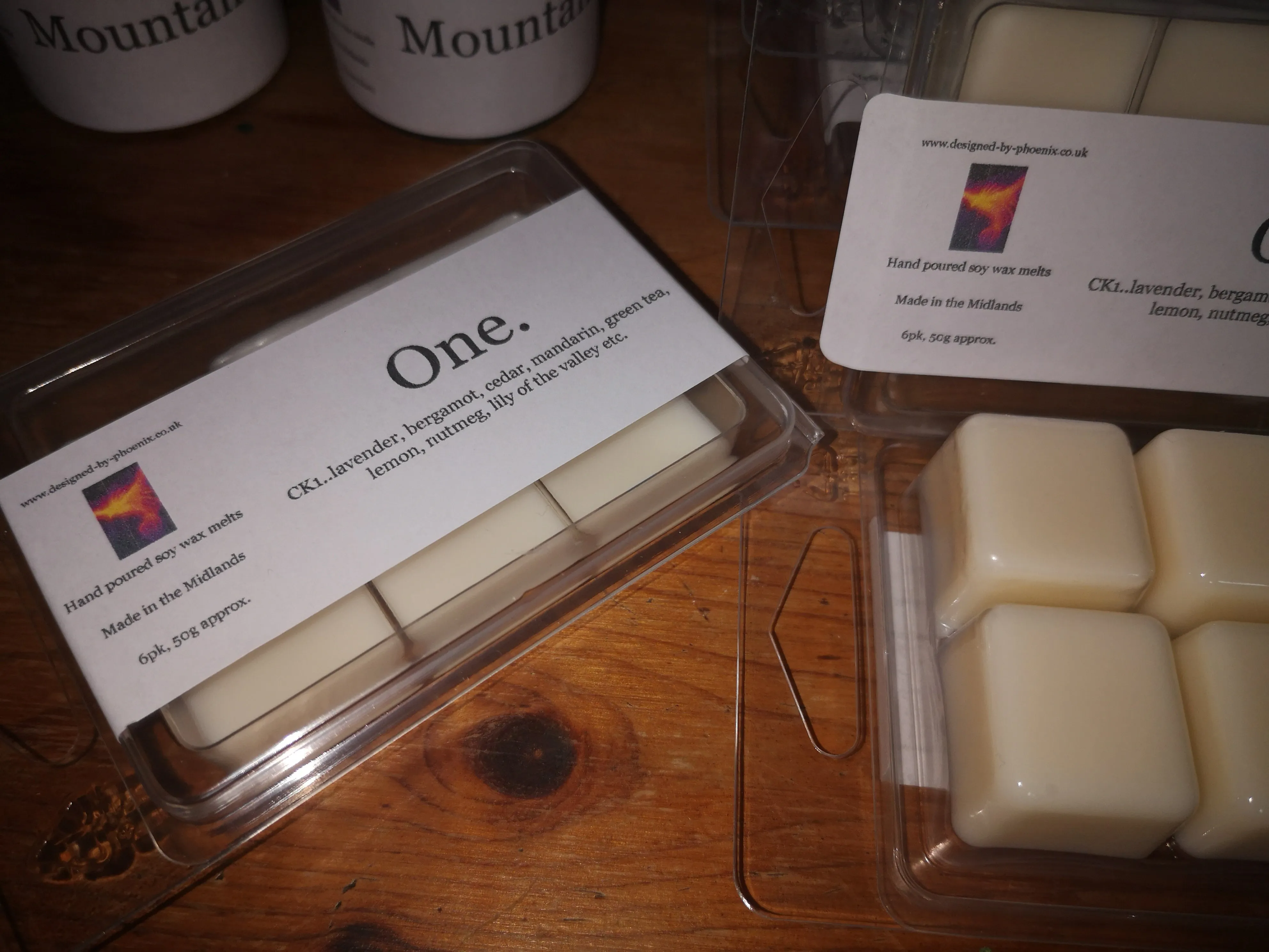 One.  (inspired by CK1 fragrance) hand poured soy wax melts & candles.